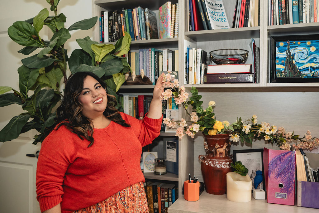 Jennifer van Alstyne in front of a bookcase